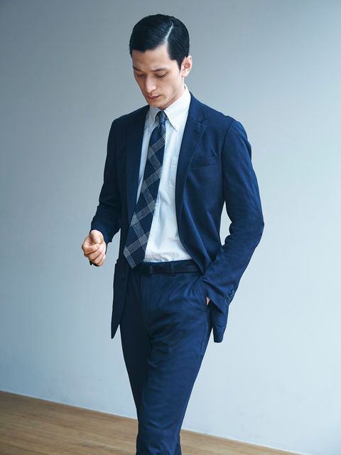 Suit, Clothing, Formal wear, Blue, Blazer, Outerwear, Tuxedo, Standing, White-collar worker, Jacket, 