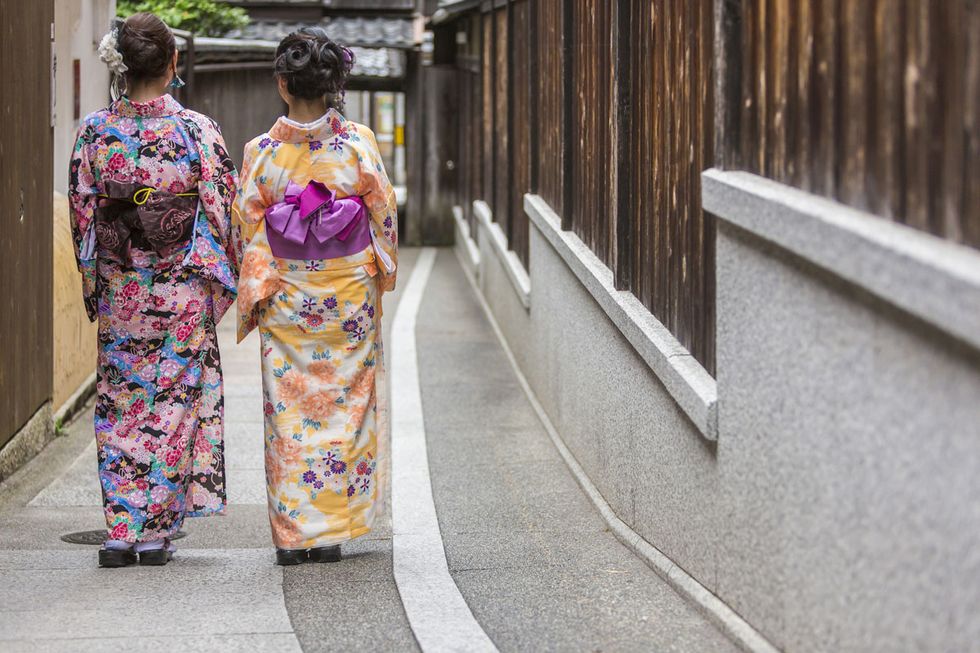 Kimono, Clothing, Dress, Costume, Yellow, Fashion, Street fashion, Temple, Sari, Plant, 