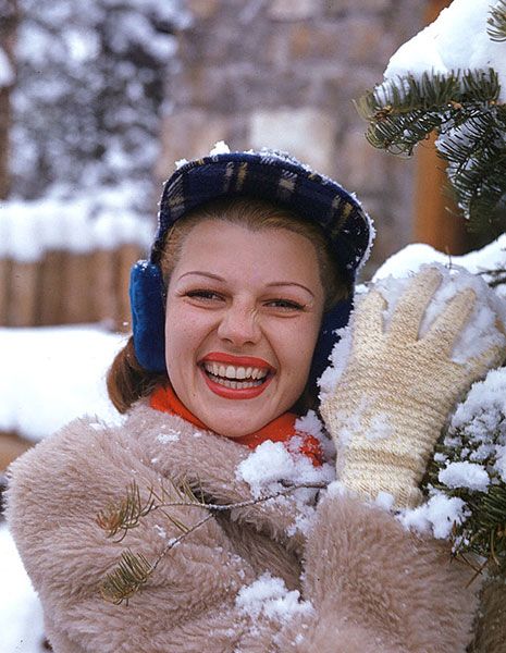 Winter, Snow, Freezing, Tooth, Headgear, Glove, Costume accessory, Fur, Laugh, Playing in the snow, 