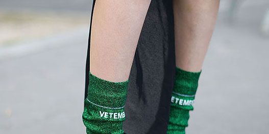 Green, Human leg, Joint, Sock, Colorfulness, Teal, Calf, Close-up, Ankle, Costume accessory, 