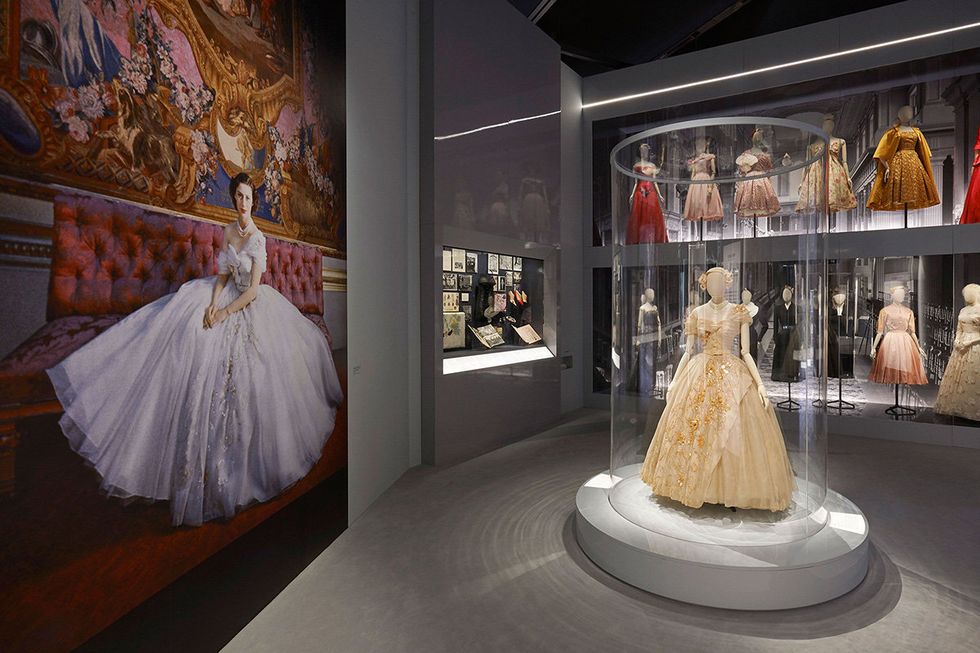 Display case, Dress, Museum, Fashion, Tourist attraction, Gown, Room, Collection, Boutique, Costume design, 