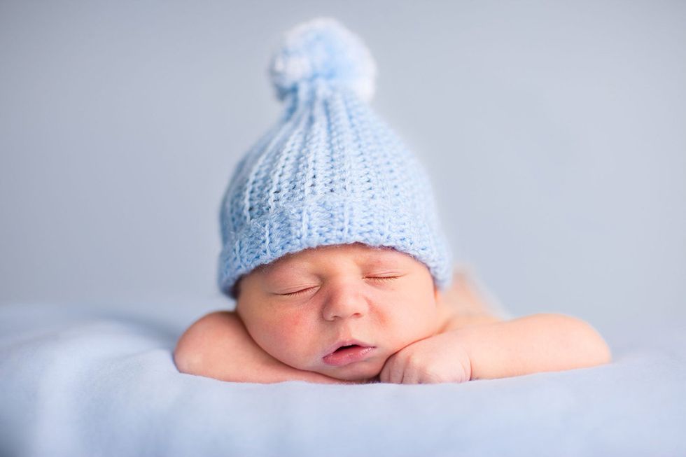 Child, Baby, Photograph, Beanie, Blue, Knit cap, Baby sleeping, Headgear, Bonnet, Cap, 