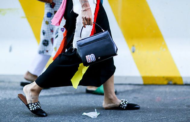 Human leg, Bag, Street fashion, Foot, Luggage and bags, Ankle, Calf, Sock, Dog clothes, Contact sport, 