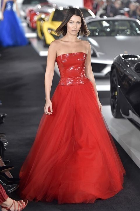 Fashion model, Dress, Gown, Clothing, Red carpet, Carpet, Haute couture, Red, Fashion, Flooring, 