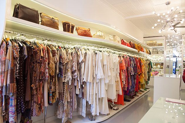 Textile, Retail, Clothes hanger, Ceiling, Light fixture, Fashion, Collection, Ceiling fixture, Interior design, Chandelier, 