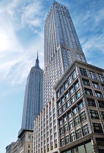 Tower block, Blue, Daytime, Sky, Architecture, Metropolitan area, Urban area, Tower, City, Facade, 