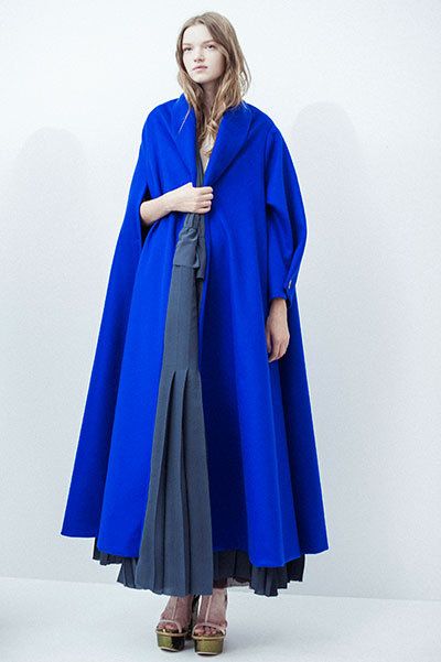 Blue, Sleeve, Standing, Electric blue, Costume accessory, Costume design, Costume, Cobalt blue, Azure, Cloak, 