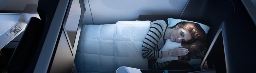 Nap, Sleep, Comfort, Seat belt, Room, Textile, Auto part, Vehicle, Car seat, Car, 