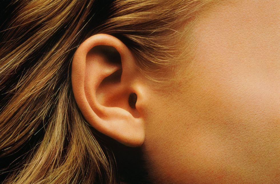 Ear, Hair, Face, Earrings, Organ, Close-up, Nose, Hearing, Chin, Body piercing, 