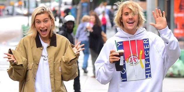 Facial expression, People, Fashion, Street fashion, Outerwear, Blond, Fun, Event, Smile, Gesture, 