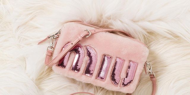 Pink, Fur, Head, Skin, Lip, Ear, Font, Footwear, Hand, Fashion accessory, 