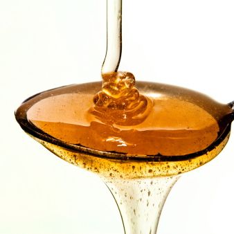 Honey, Caramel color, Cooking oil, Syrup, Liquid, Sauces, Oil, Ingredient, Vegetable oil, Glass, 