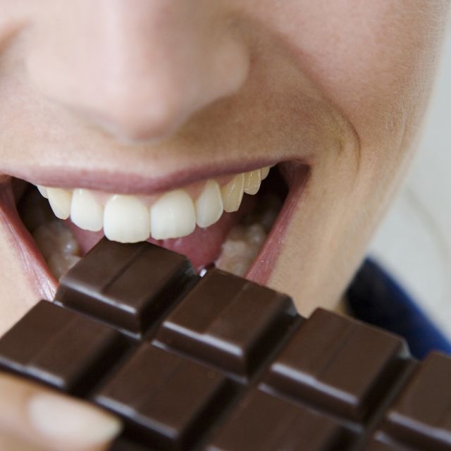 Chocolate, Chocolate bar, Mouth, Sweetness, Tooth, Food, Close-up, Smile, Confectionery, 