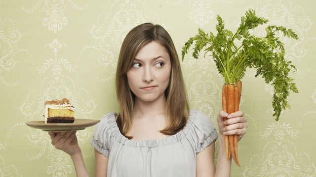 Carrot, Plant, Food, Brown hair, Vegetable, Vegetarian food, Long hair, Gesture, Leaf vegetable, Food craving, 