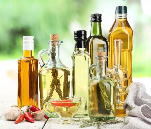 Bottle, Glass bottle, Product, Vegetable oil, Wine bottle, Cooking oil, Alcohol, Olive oil, Cottonseed oil, Oil, 