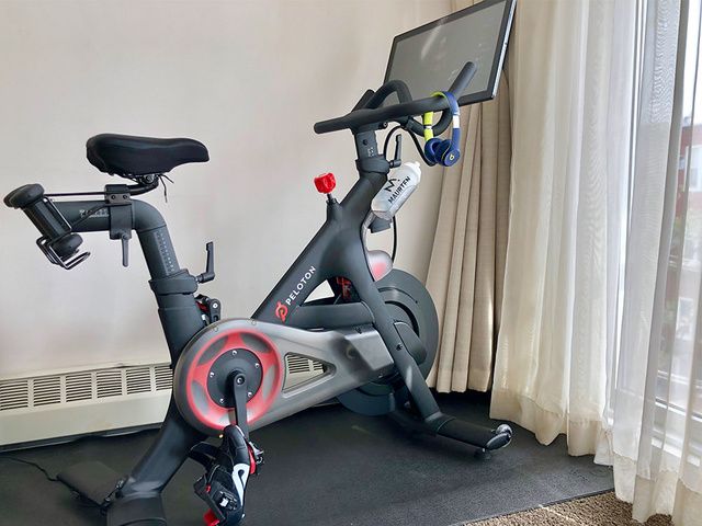 Stationary bicycle, Indoor cycling, Exercise machine, Exercise equipment, Vehicle, Bicycle, Bicycle accessory, Sports equipment, Exercise, Bicycle trainer, 