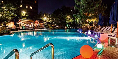 Swimming pool, Leisure, Resort, Lighting, Night, Vacation, Resort town, Hotel, Building, Fun, 