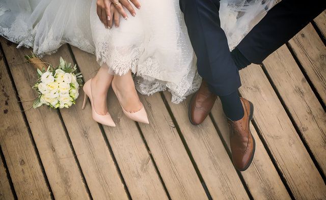 Bride, Finger, Hand, Dress, Leg, Wedding dress, Nail, Footwear, Bridal clothing, Marriage, 