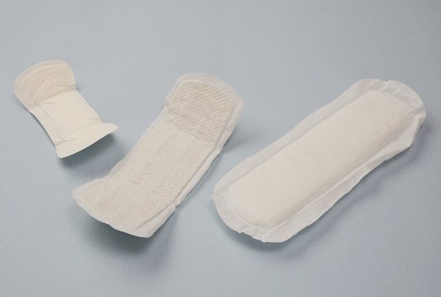 Sock, Adhesive bandage, Bandage, Footwear, Leg, Finger, Cotton pad, Foot, Wool, 