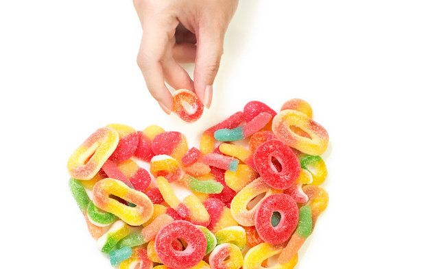 Heart, Hand, Finger, Food, Plant, Hard candy, Confectionery, Petal, Gummi candy, Candy, 
