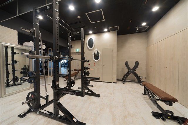 Gym, Room, Sport venue, Weightlifting machine, Physical fitness, Crossfit, Exercise equipment, Exercise machine, Bench, Building, 