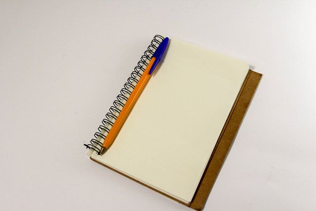 Notebook, Yellow, Paper product, Paper, Font, Book, Rectangle, 