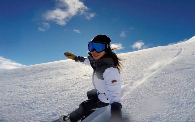 Skier, Snow, Recreation, Ski helmet, Snowboarding, Winter sport, Winter, Piste, Sports equipment, Ski, 