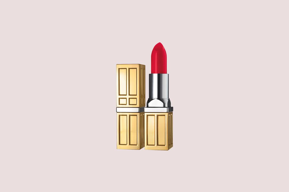 <p>We can only hope to&nbsp;rock a bold lip as well as Her Majesty, who's often spotted giving her pout a touch-up at events,&nbsp;does at 91. And it's no secret that she favors&nbsp;Elizabeth Arden, as&nbsp;the brand has&nbsp;upheld their warrant since 1962. &nbsp;While no one can nail down her favorite&nbsp;shade, the Queen is known to gravitate toward&nbsp;deep&nbsp;reds and punchy&nbsp;pinks.</p><p>Elizabeth Arden Beautiful Color Moisturizing Lipstick in Red Door Red, $25;&nbsp;<a href="http://www.elizabetharden.com/beautiful-color-moisturizing-lipstick-1002BLSC400.html" data-tracking-id="recirc-text-link">elizabetharden.com</a>.</p>