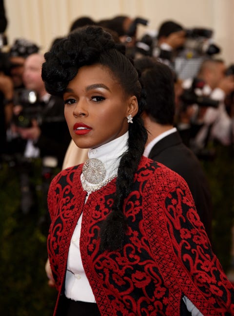 <p>The bigger and bolder, the better, says the wisdom of Janelle Moná<span class="redactor-invisible-space" data-verified="redactor" data-redactor-tag="span" data-redactor-class="redactor-invisible-space"></span>e. Here she piles a tilted braid atop her head and lets the rest hang down on her shoulders in a side braid. </p>