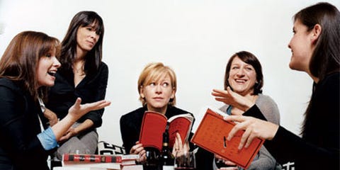 Book Club women around a table full of books