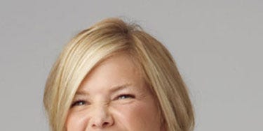 Hairstyle Handbook laughing girl with blond hair in a half updo
