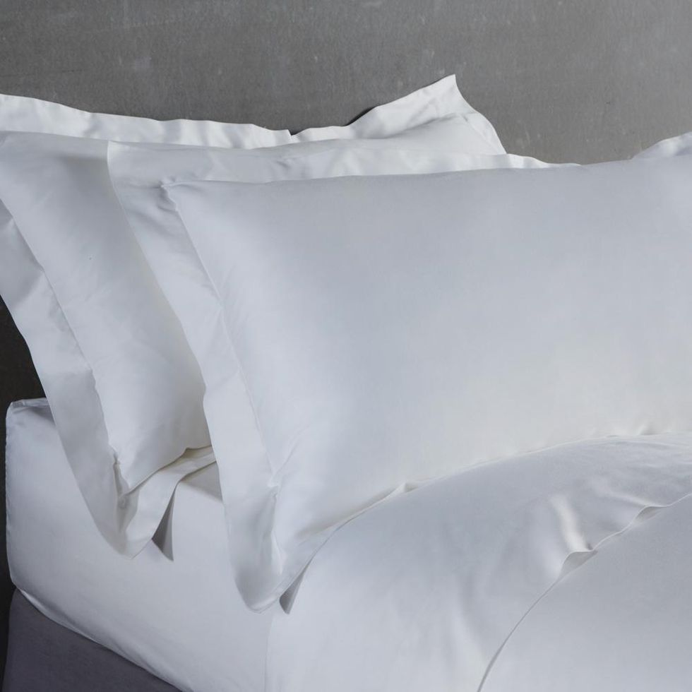 White, Bed sheet, Bedding, Pillow, Textile, Linens, Duvet, Paper, Room, Duvet cover, 
