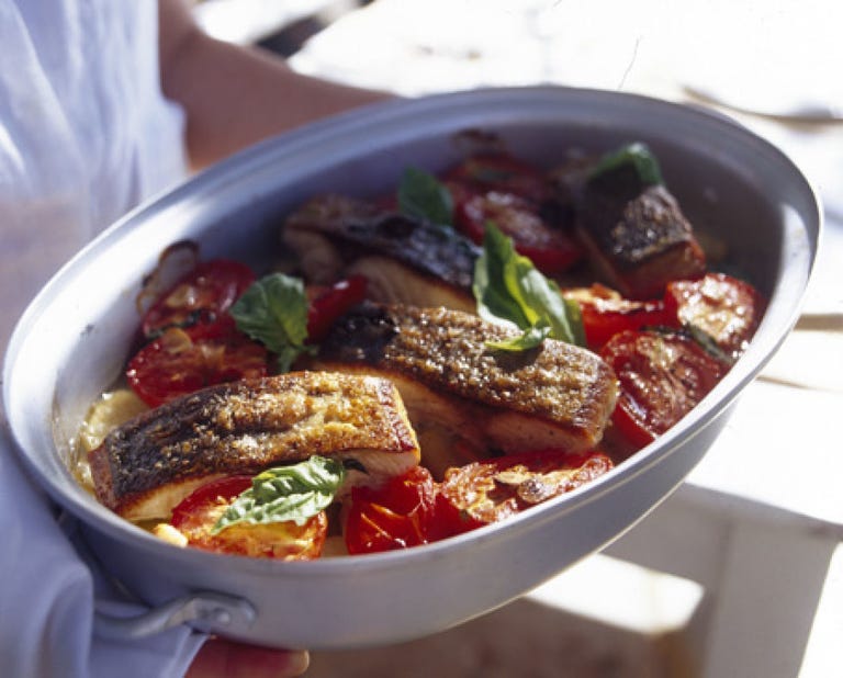 Salmon with olives, potatoes and tomatoes