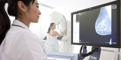 Radiologist reviewing results of patients mammogram