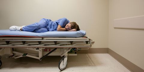 Female medical worker napping in hospital