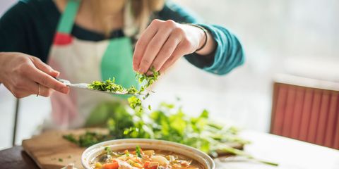 A woman making healthy food