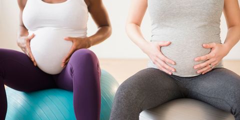 Pregnant women exercising on a swiss ball