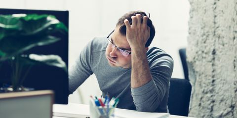 Stressed man in office