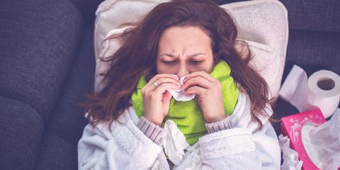 Woman suffering from influenza