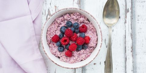 Overnight oats porridge with raspberries and blueberries