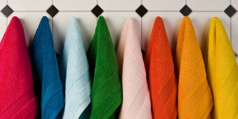 Multi-coloured towels hanging up
