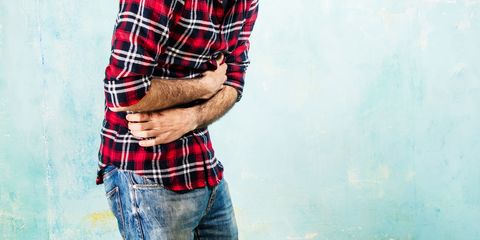 Man with stomach ache in pain