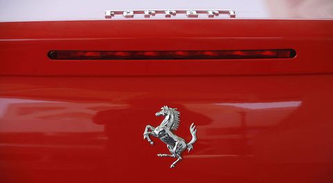 Red, Vehicle, Emblem, Car, Symbol, Badge, Vehicle door, 