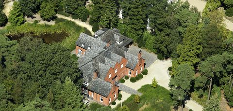 Aerial photography, Property, Natural landscape, Biome, Estate, House, Mountain village, Tree, Building, Roof, 