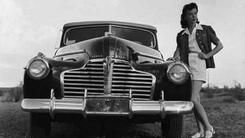 Circa 1935: British leading lady Ida Lupino (1918-1995) daughter of the renowned British actor, Stanley Lupino, standing by a Buick Super. (Photo via John Kobal Foundation/Getty Images)