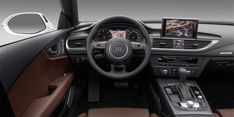 Motor vehicle, Steering part, Automotive design, Steering wheel, Product, Automotive mirror, Center console, Vehicle audio, White, Car, 