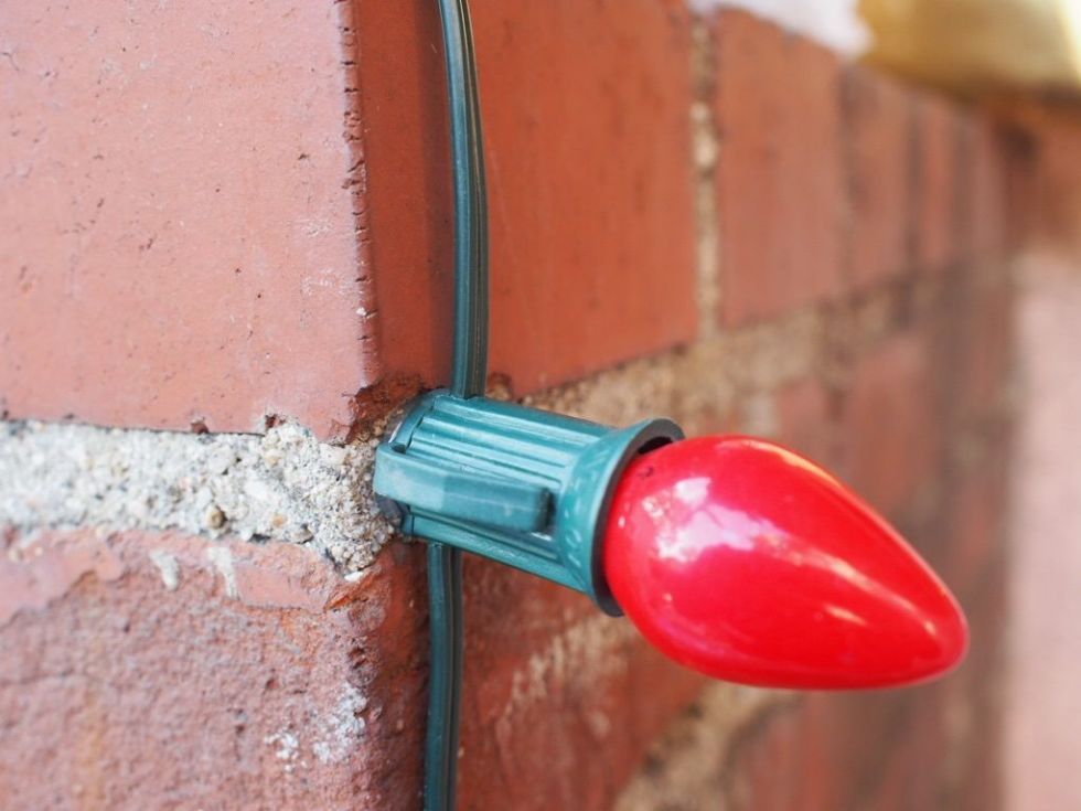 How to Use Hot Glue to Fasten Christmas Lights to Brick or Stucco