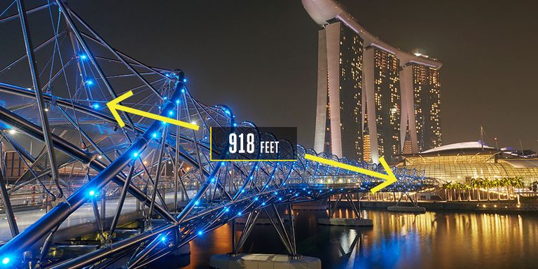 <p><strong>Singapore</strong></p><p>Inspired by the shape of DNA, the Helix Bridge offers Singapore pedestrians 918 feet of architectural intrigue and artistic expression. The bridge in Marina Bay uses multiple styles of steel to curve and sweep, opening up at five points for viewing platforms. The steel tubes serve as the visual spectacle. If straightened and laid end to end, they would stretch 7,380 feet.</p>