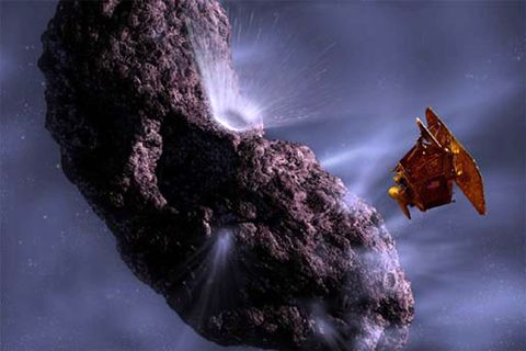 This artist's impression shows the deep impact spacecraft as it fires an impactor into comet Temple 1. Scientists are hoping to find out more about the origins of our universe by studying the comet