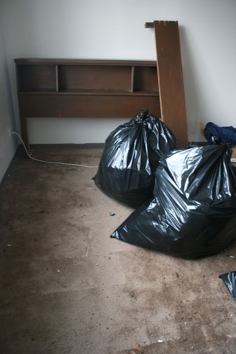 <p>Broken wood and exposed nails can quickly tear through a trash bag. Double bag the wall pieces of wood and plaster to prevent breakage as you are carrying the trash through your house. Clean up as you go, so you've got more room to move and less trash to pickup when you're done.</p>